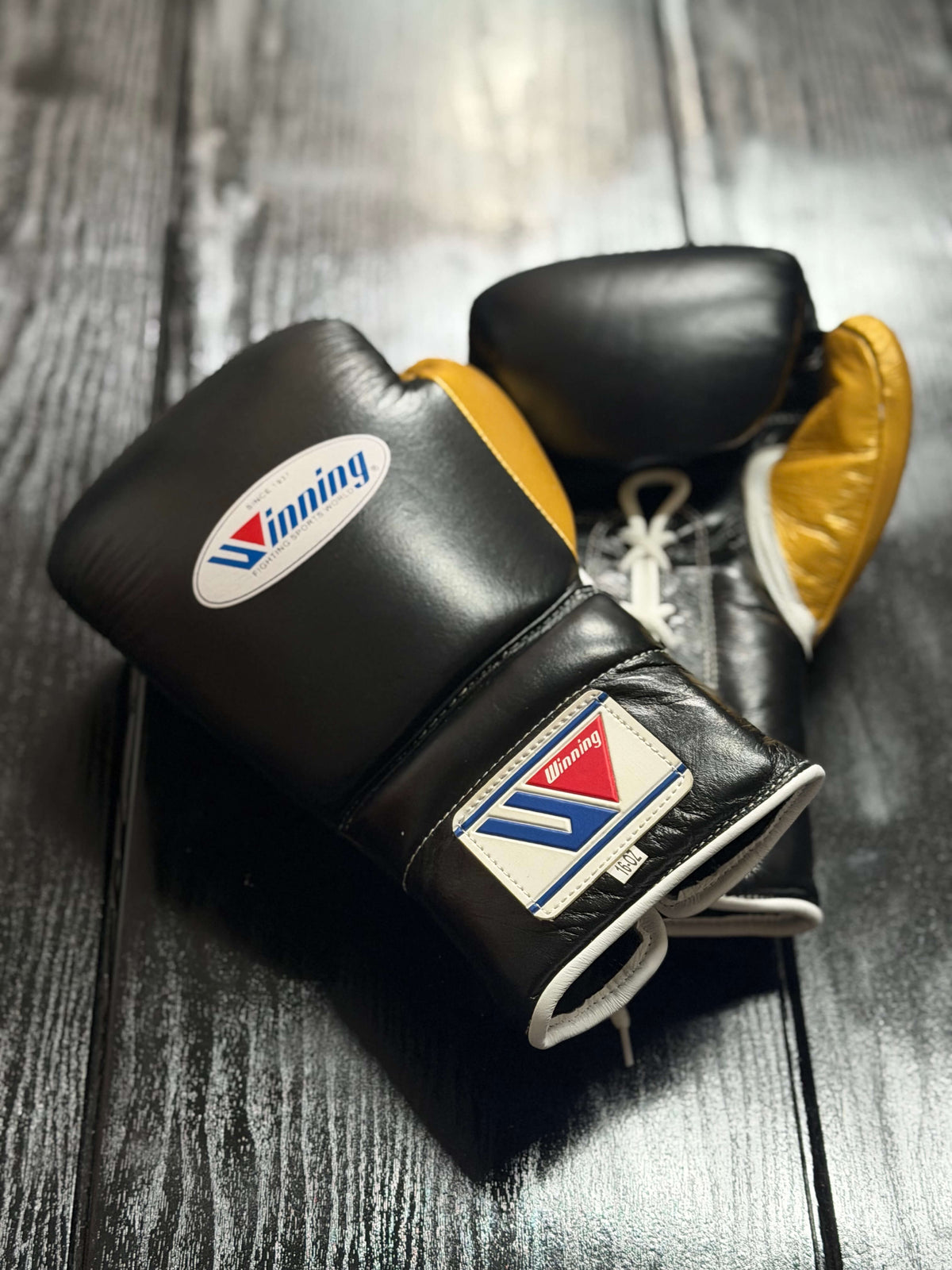 Winning Boxing Gloves Black/Gold Leather Training Gloves for Sparring