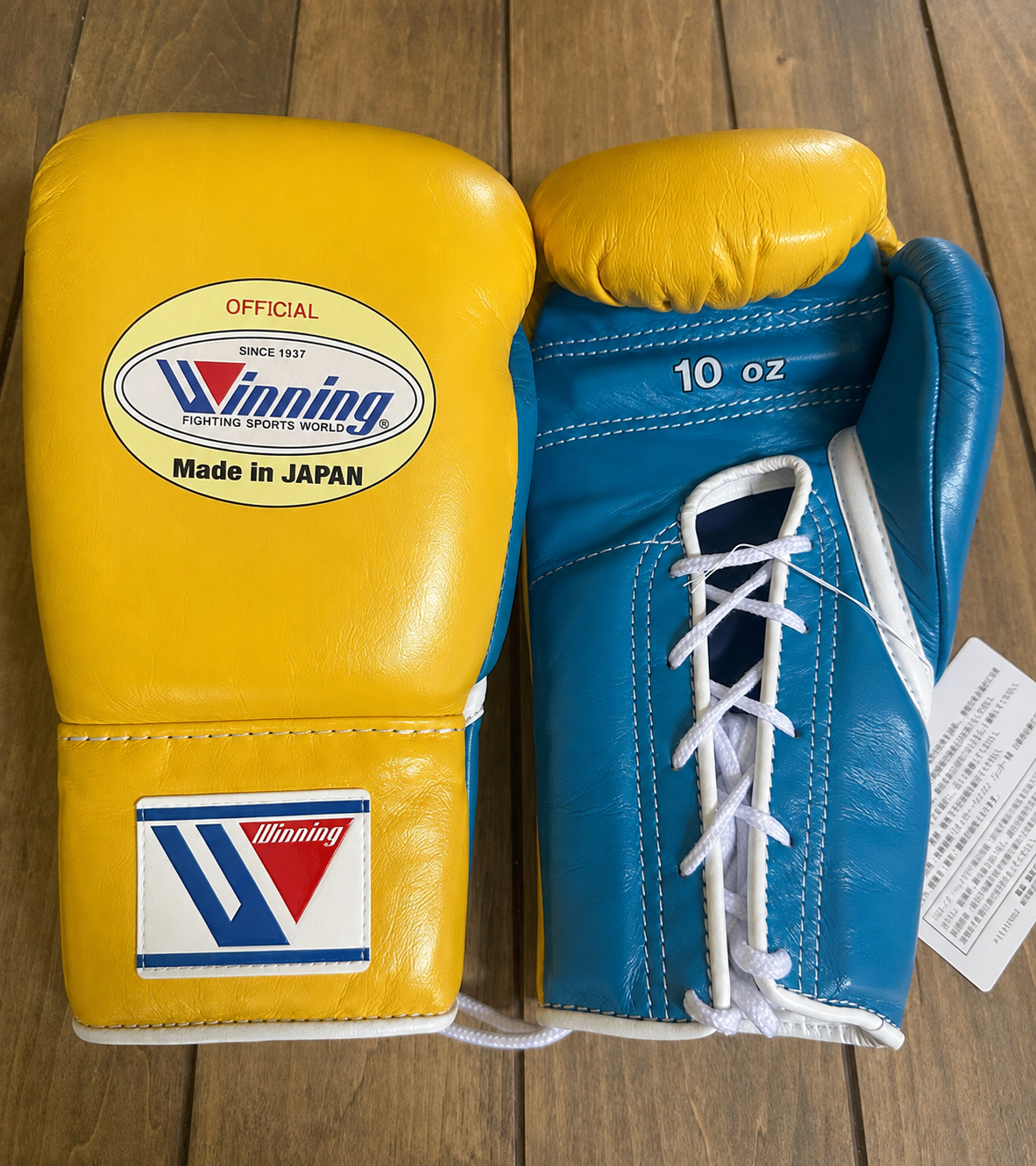 Winning Boxing Gloves Yellow/Blue Curved Leather Gloves for MMA Training