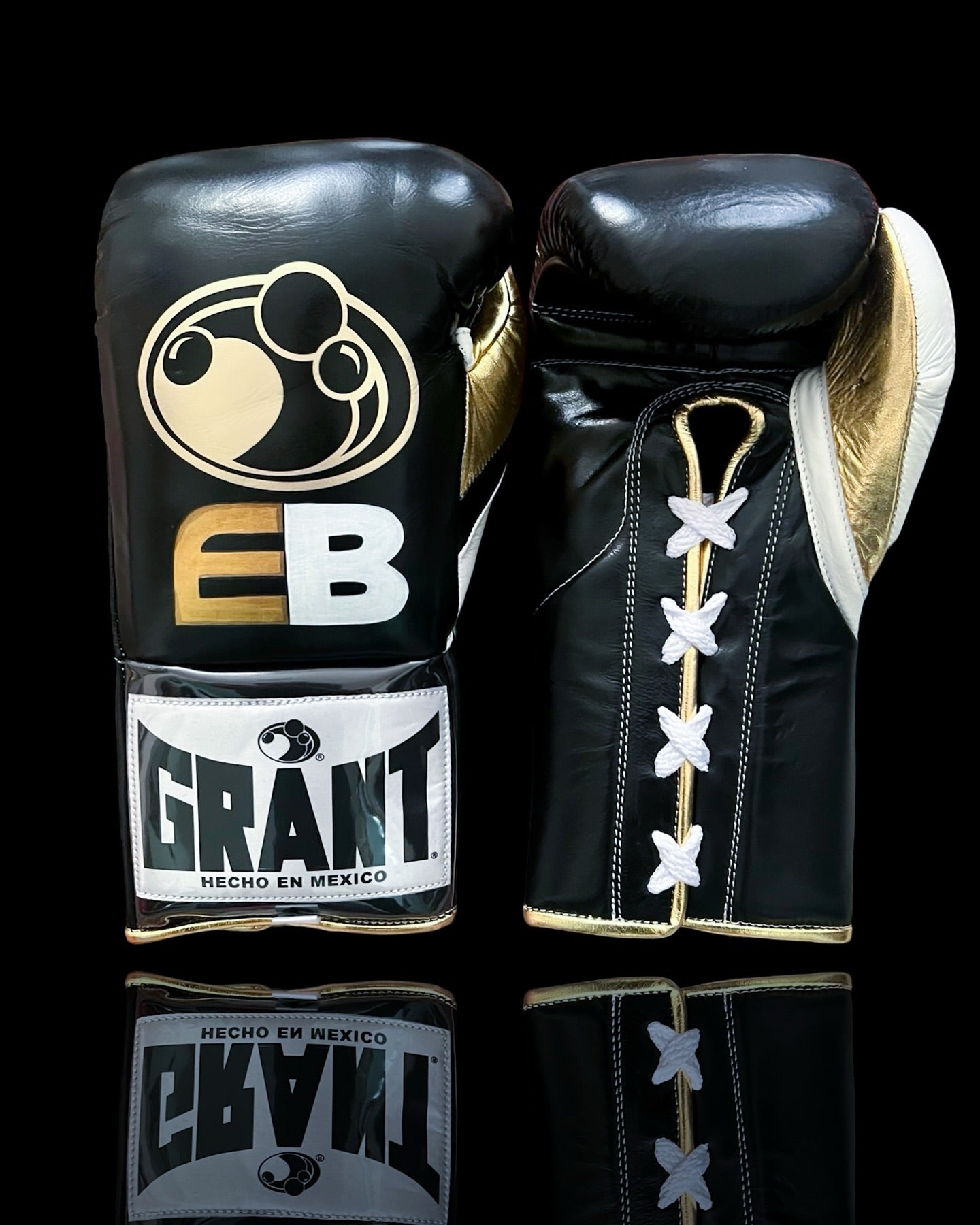grant boxing gloves black/gold/white front view premium leather fight gear