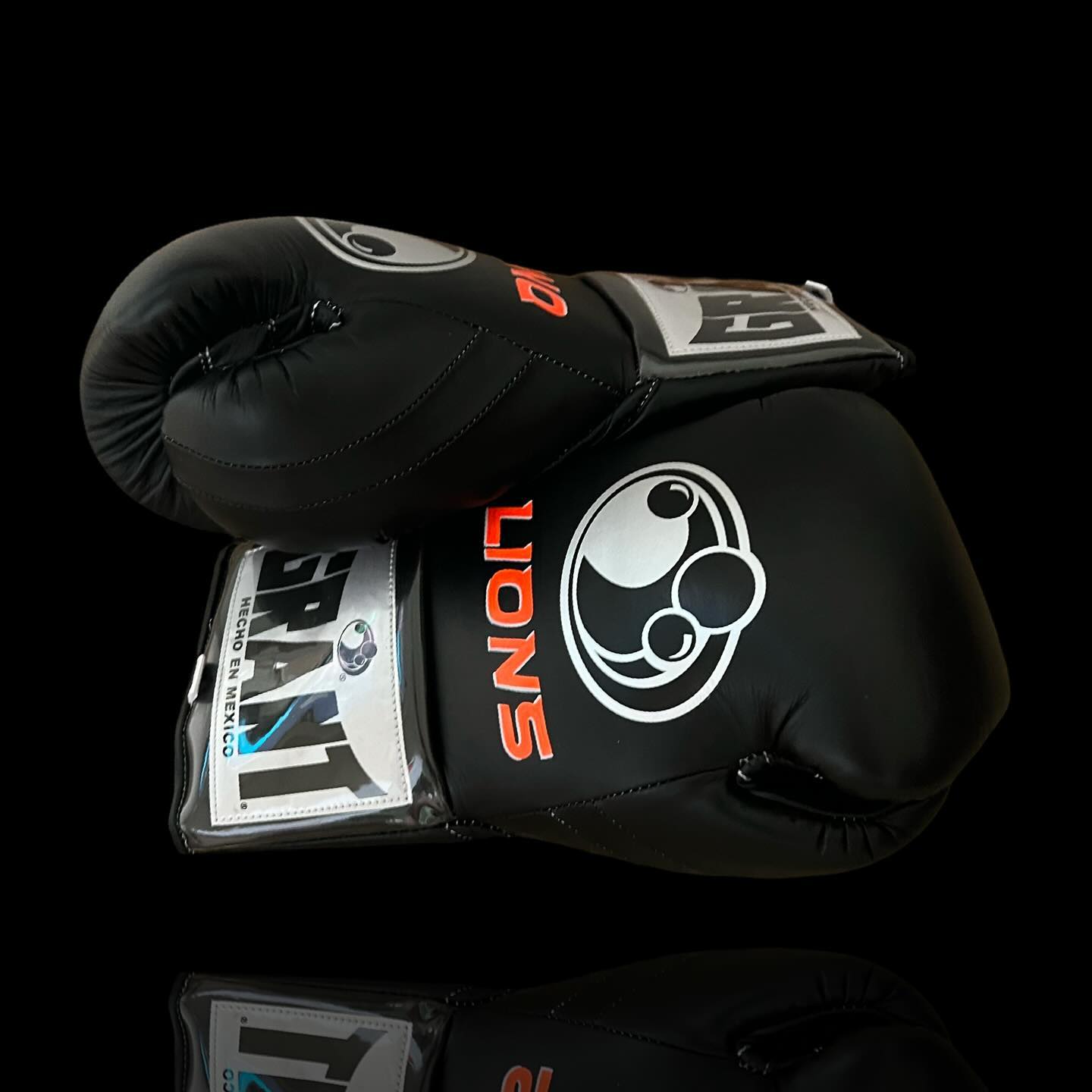 grant boxing gloves black/orange back and thumb view premium leather professional training gloves
