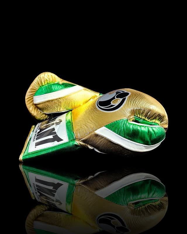 grant boxing gloves gold/green/white back and thumb view professional sparring and training gear