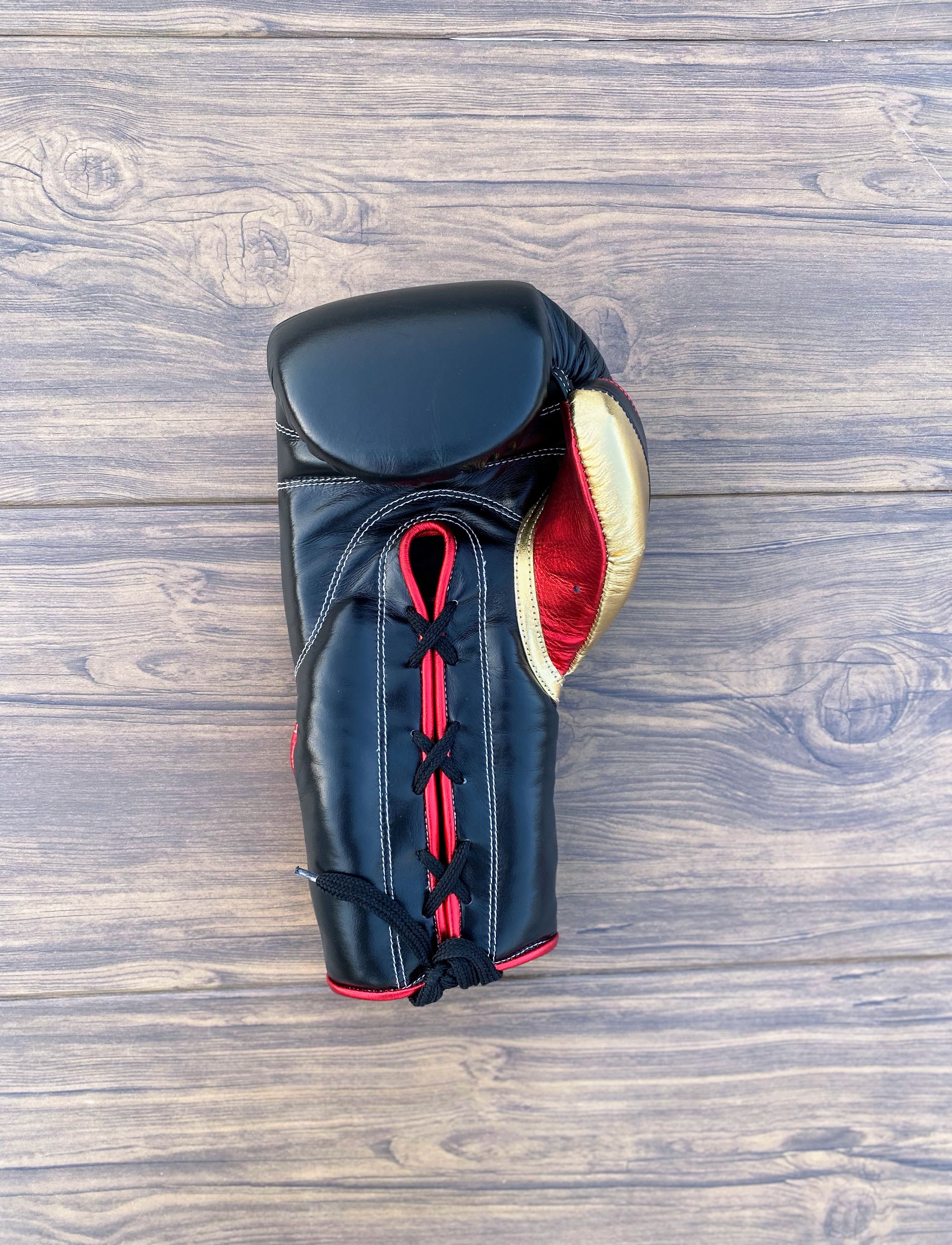 grant boxing gloves black/red/gold front and thumb view  premium leather fight gear
