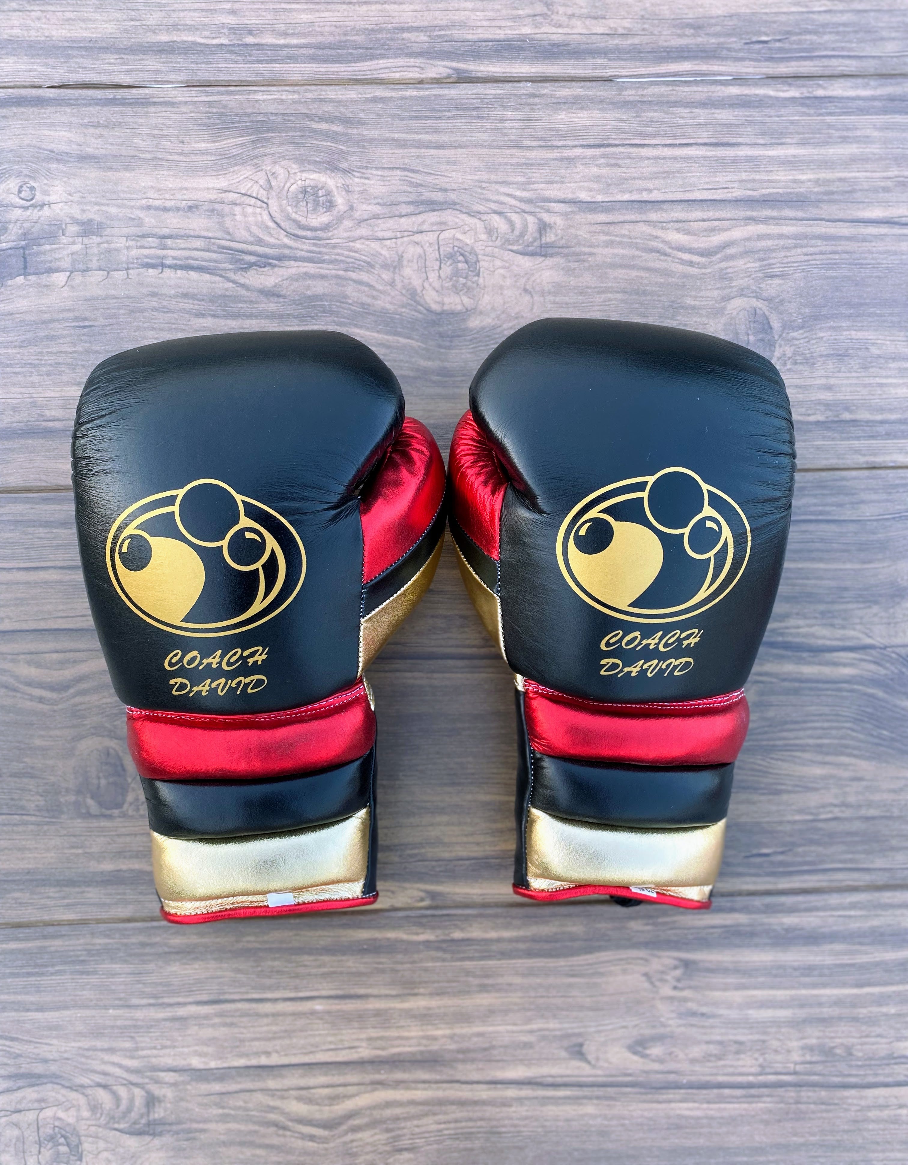 grant boxing gloves black/red/gold back and thumb view  premium leather fight gear
