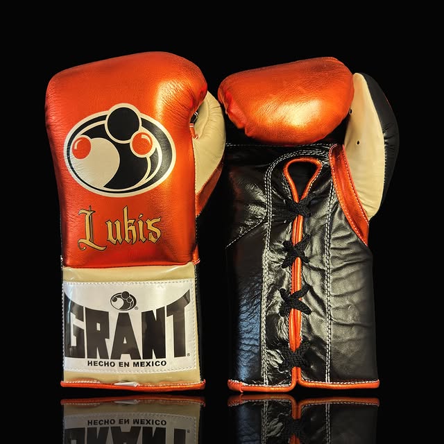 grant boxing gloves orange/black/gold front view premium leather fight gear 