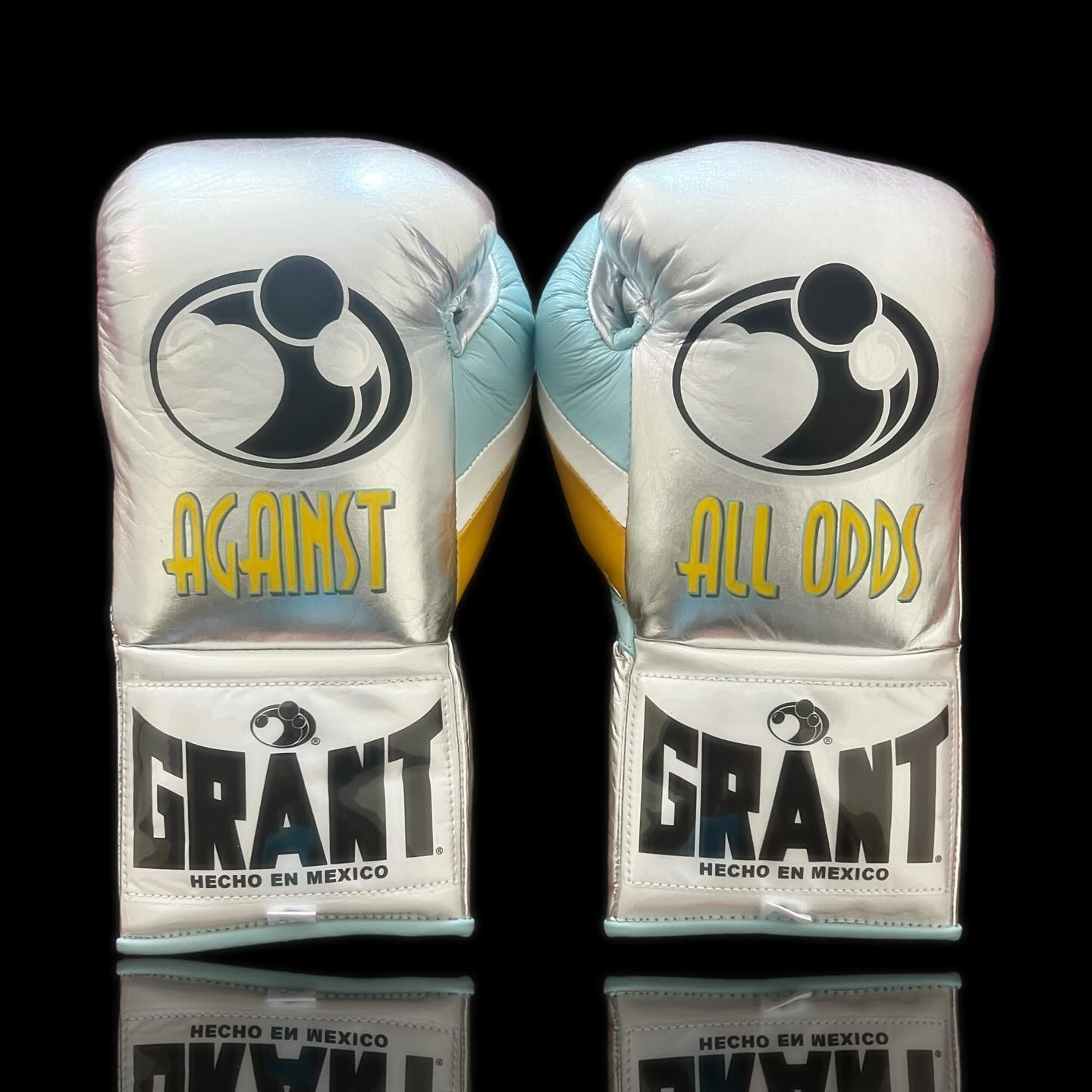 grant boxing gloves silver-blue-yellow back view premium fight gloves for athletes